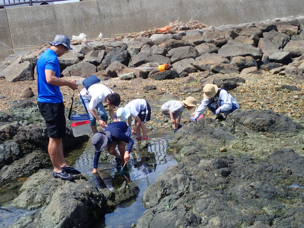 なごや環境大学共育講座の開会式で参加者に注意事項を説明する様子